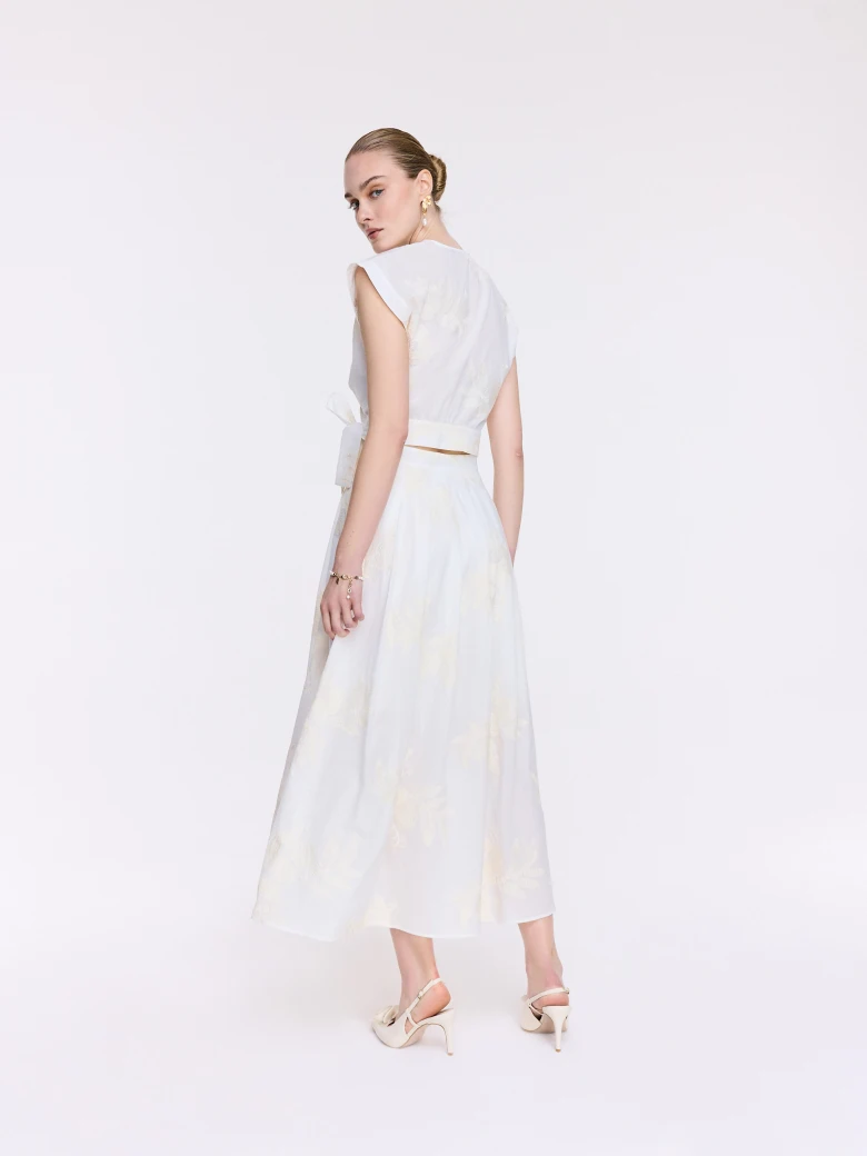 High-waisted cream-colored embroidered skirt
