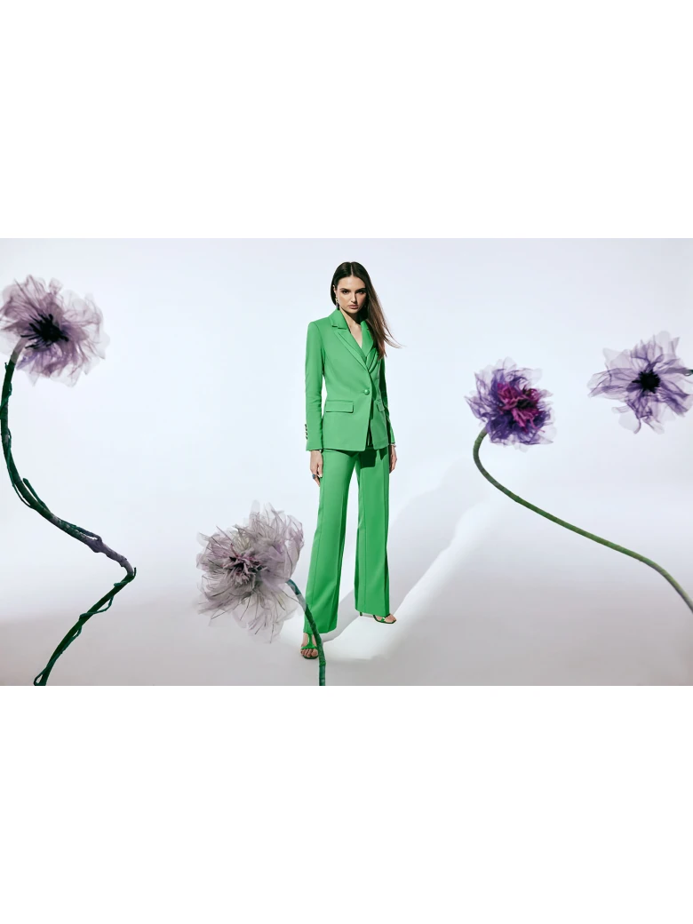 Classic green jacket with a single button closure