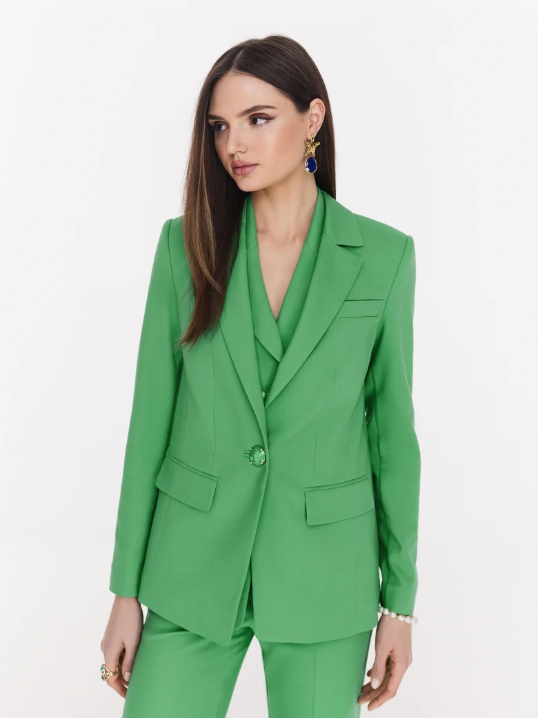 Classic green jacket with a single button closure