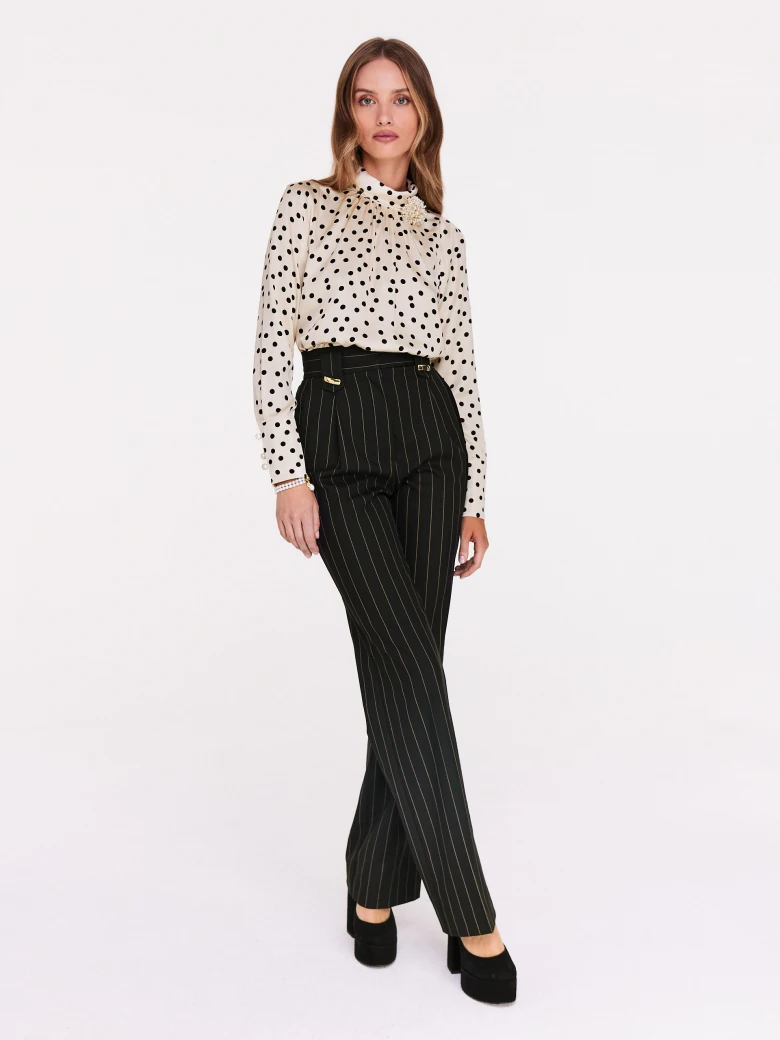 Cream pea blouse with pearl brooch