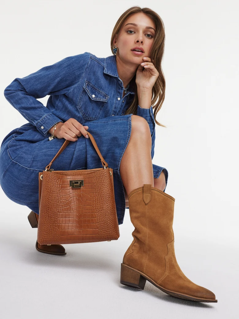Brown leather cowboy boots