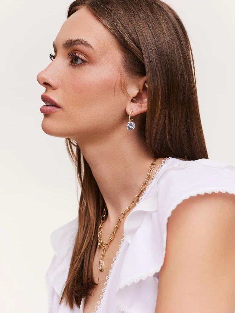 Earrings with light purple zircons