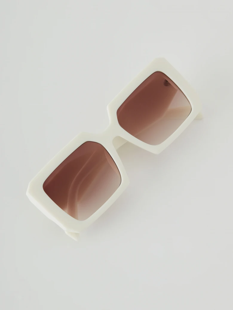 Cream sunglasses with rectangular frames