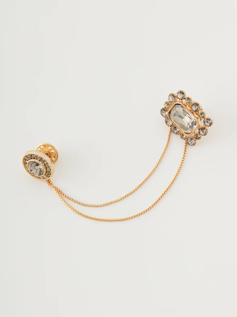 Brooch with jewelry pins connected by a chain