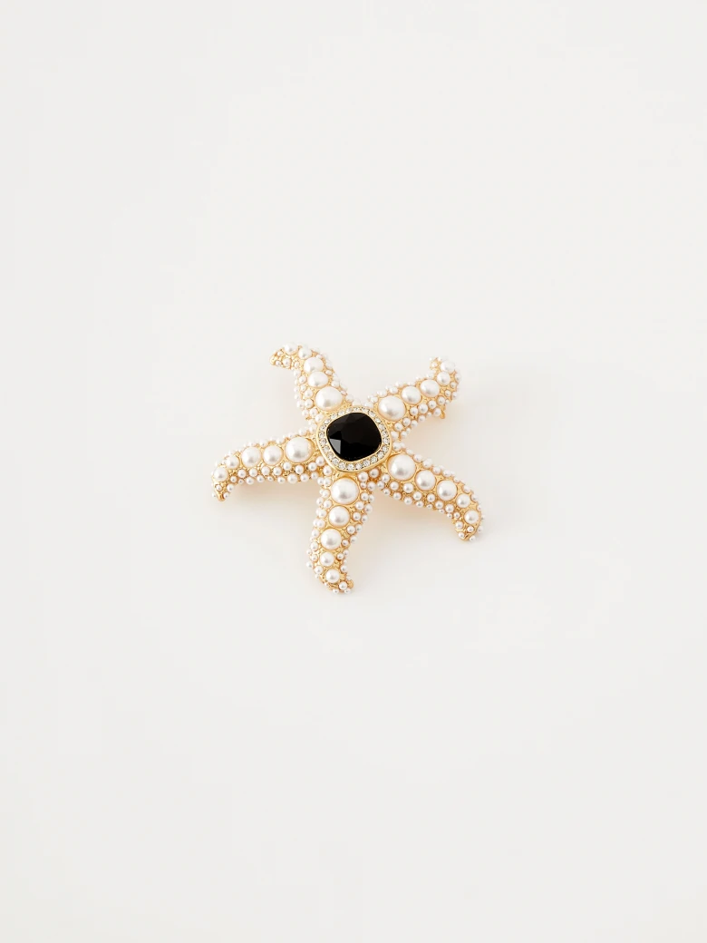 Starfish-shaped brooch with pearls