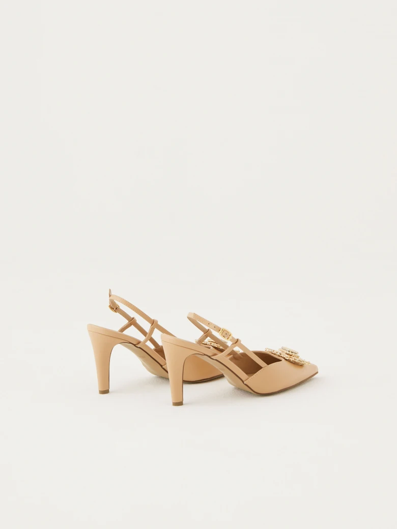 Beige pumps with open heel and crystals