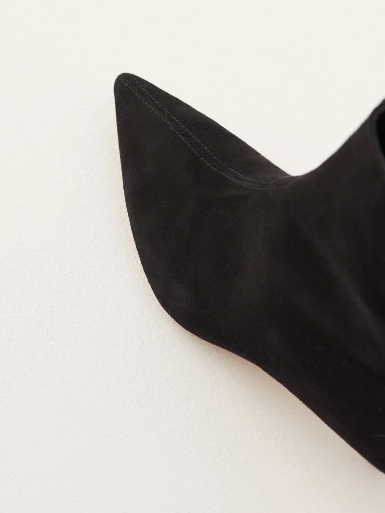 Black suede boots with gold elements