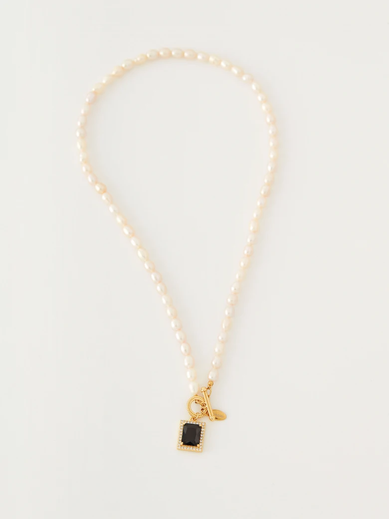 Necklace with cultured pearls and zircons