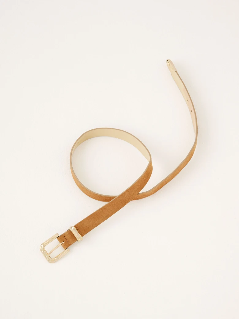 Brown leather belt with decorative buckle