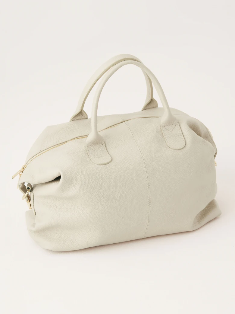Beige natural leather travel bag