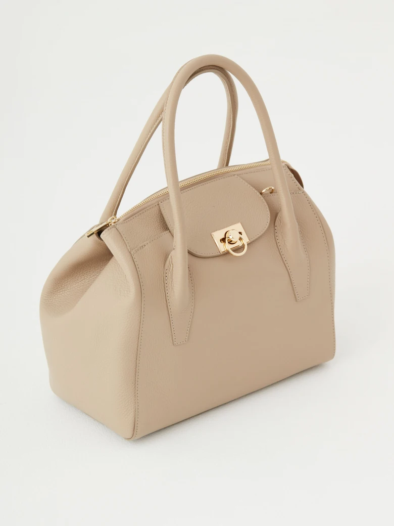 Large handbag in beige color