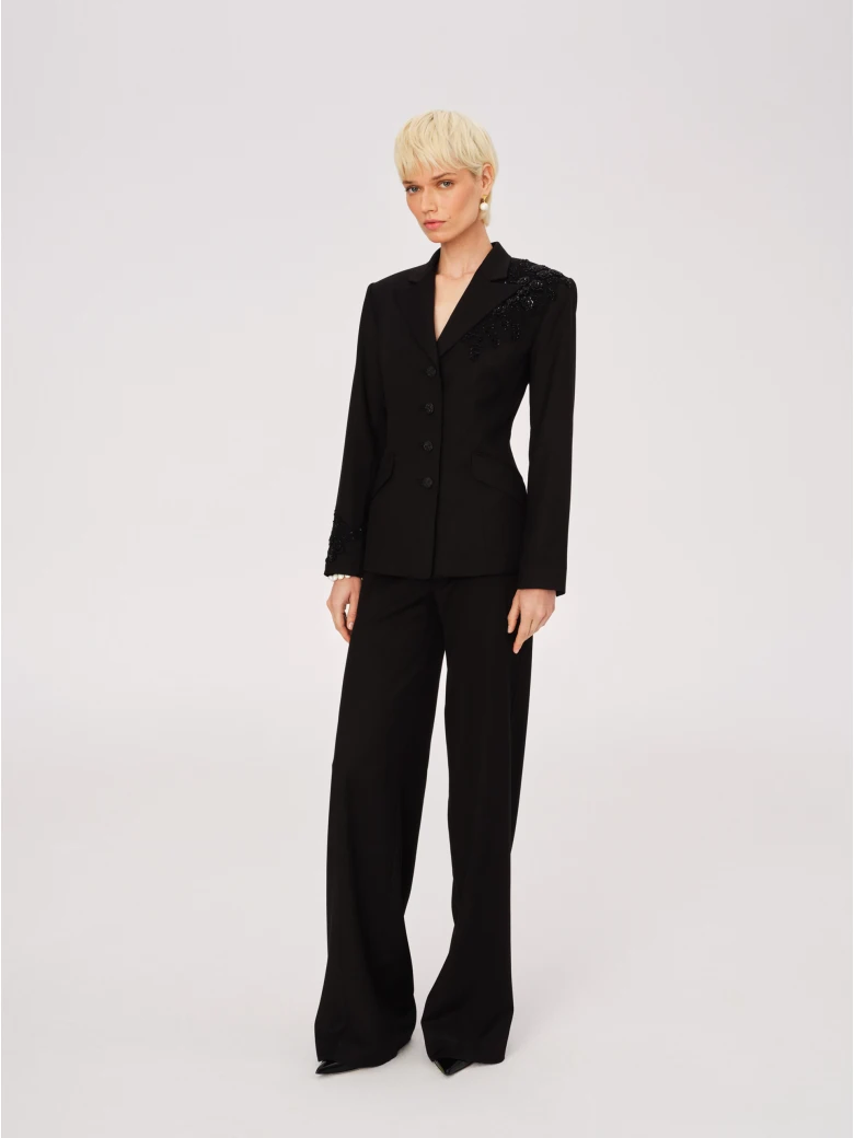 Elegant black pants with jeweled appliqué
