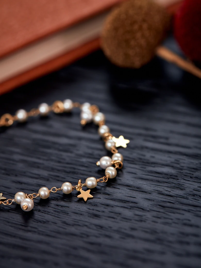 GOLD PLATED BRACELET WITH PEARLS