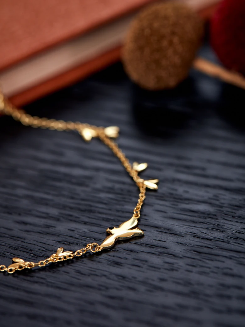 GOLD PLATED NECKLACE WITH PIGEON AND LEAVES