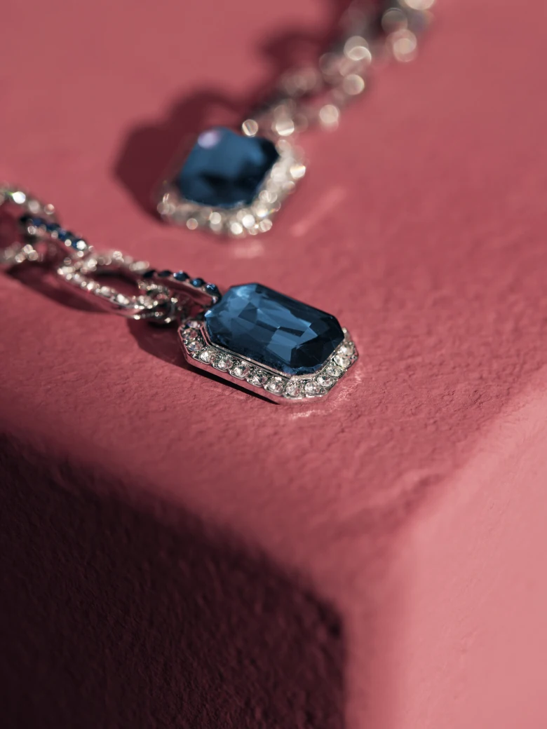 EARRINGS WITH BLUE STONE