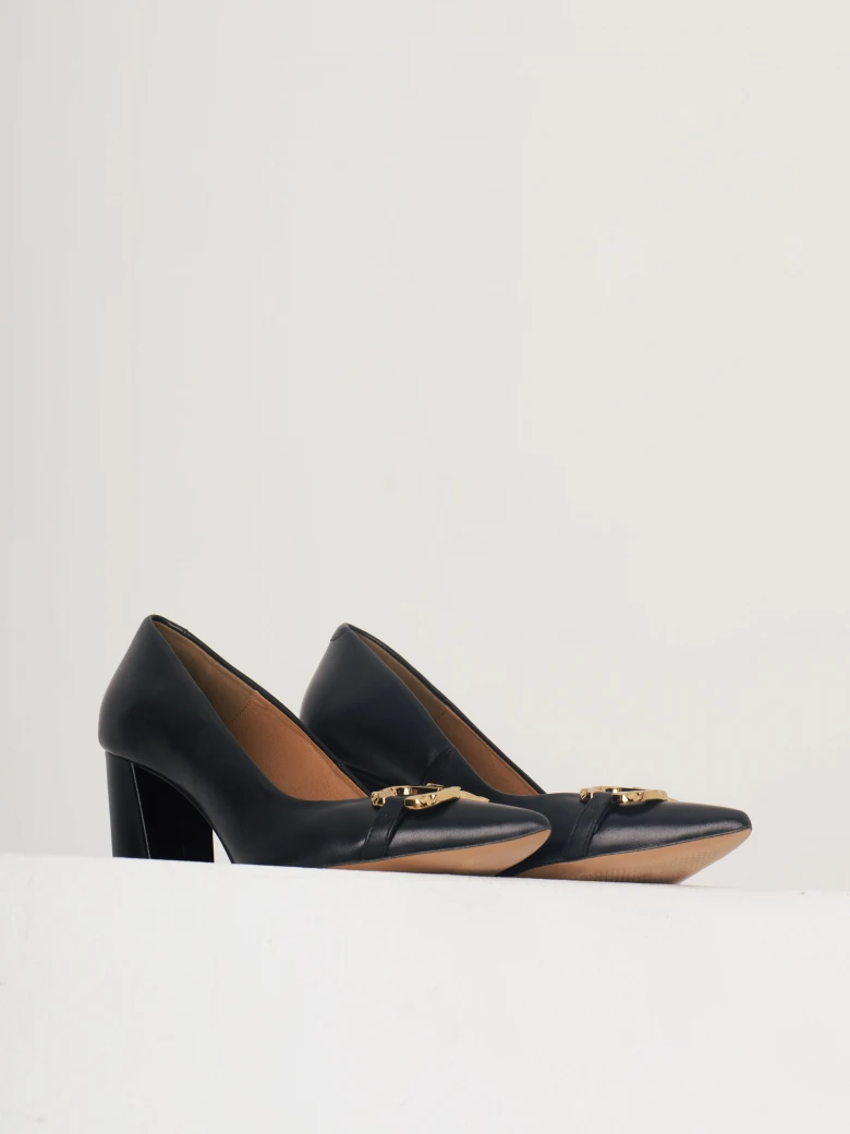 Black heels with golden buckle