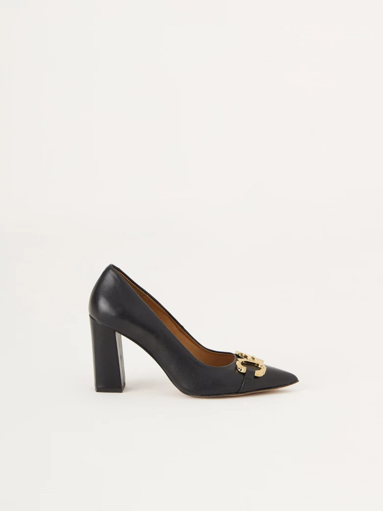 Black heels with golden buckle