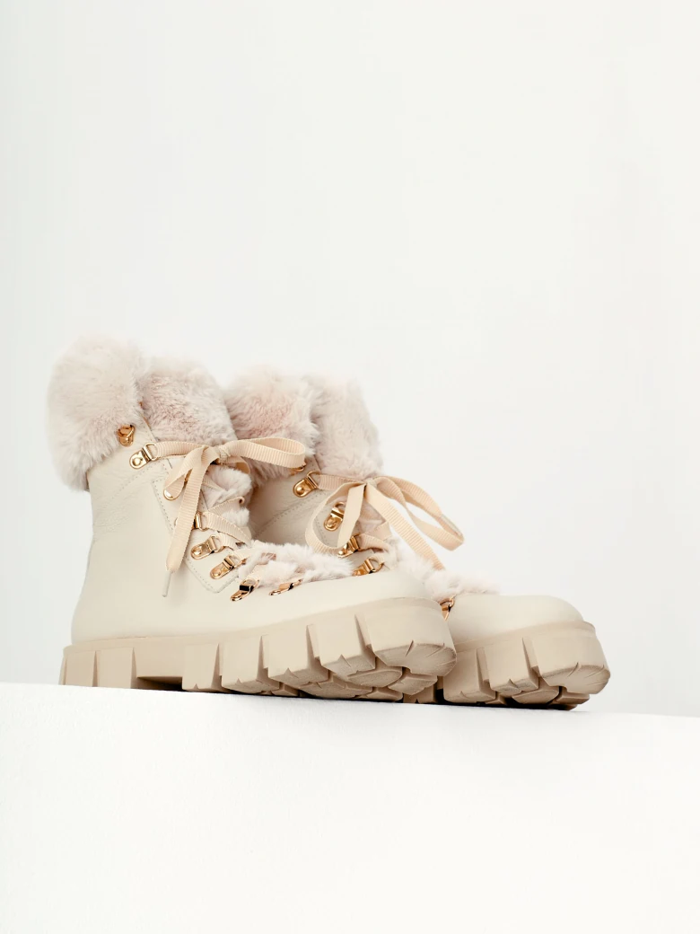 Lace-up boots in beige color