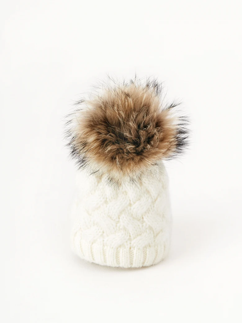 White cap with pom-pom