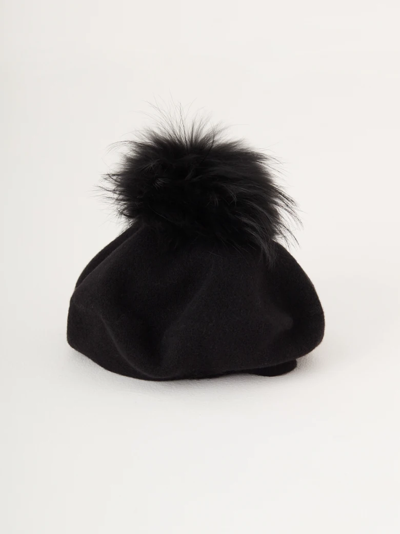 Black beret with decorative pom-pom