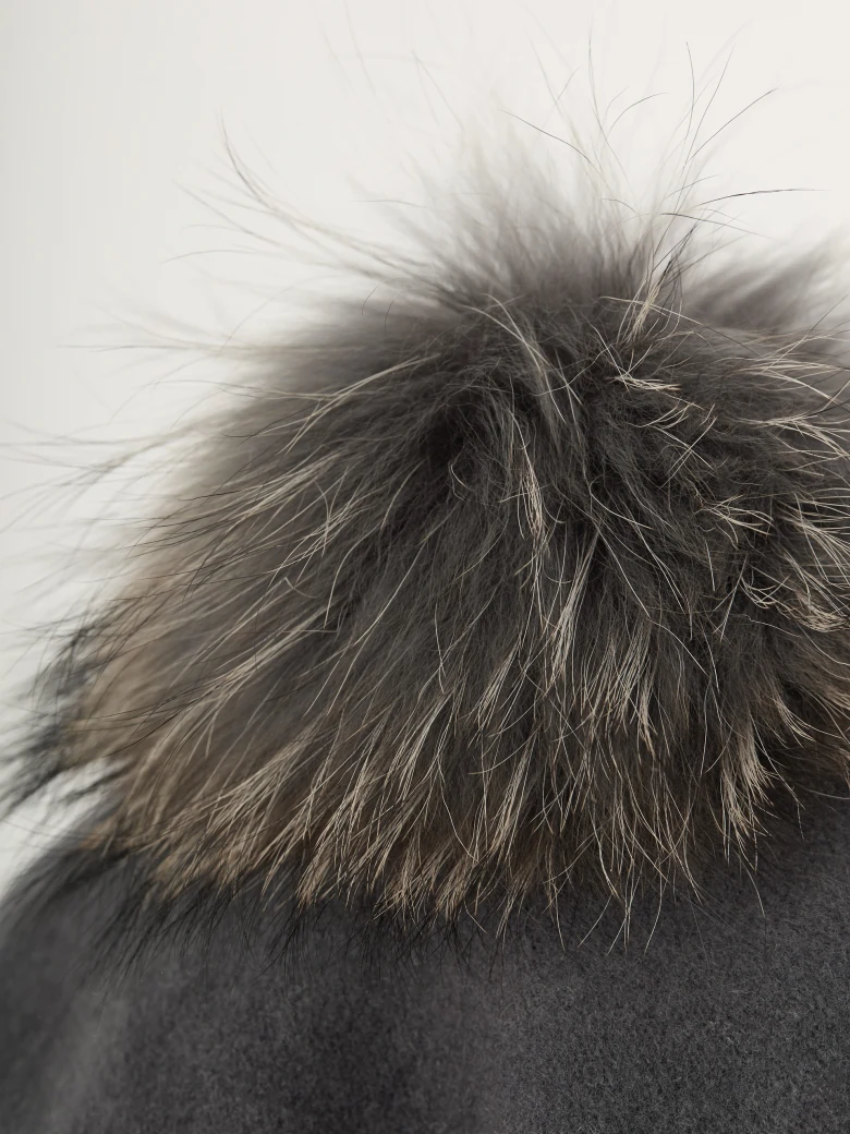 Grey beret with decorative pom-pom