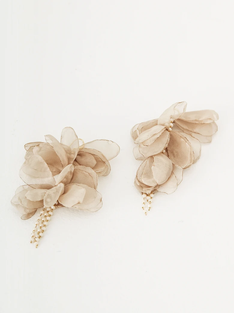 Earrings decorated with flowers and crystals