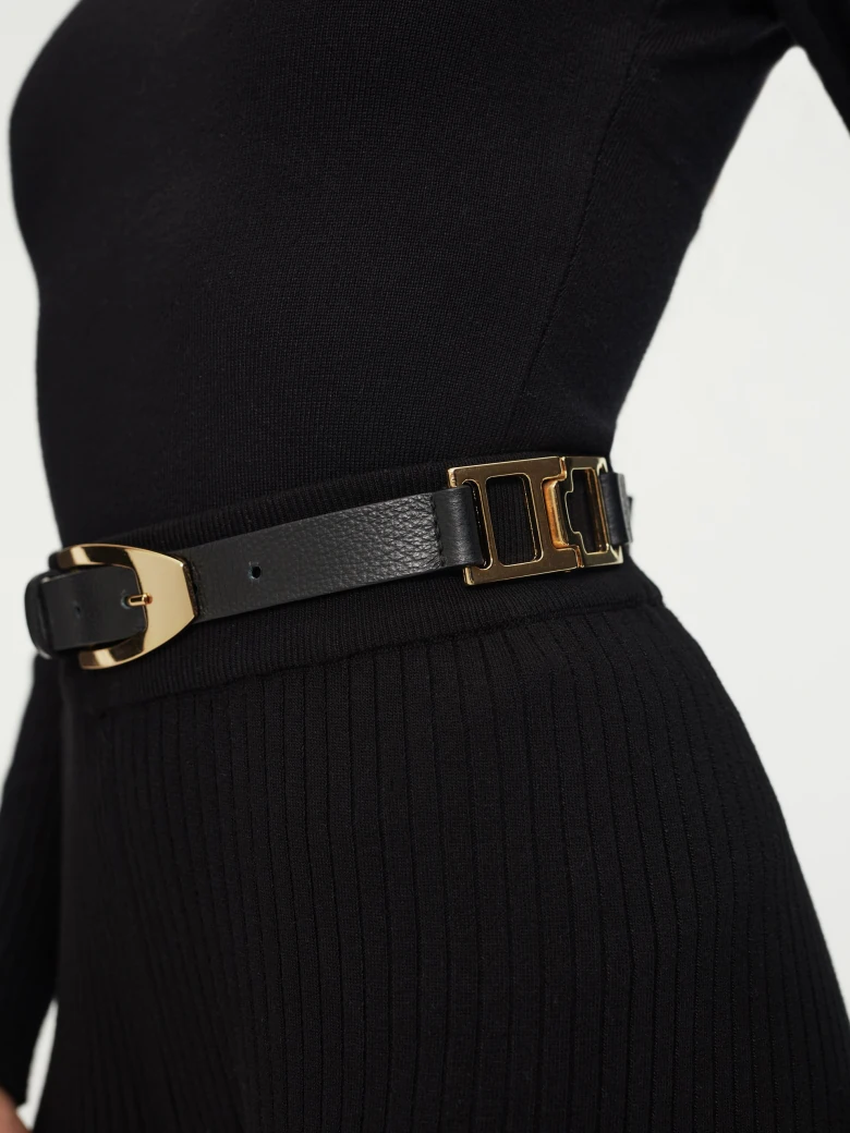 Black belt with gold buckle