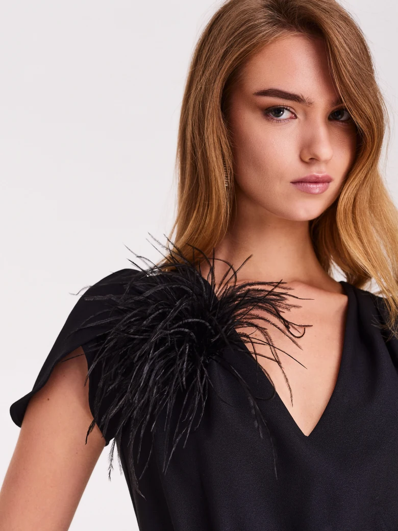 Black feather brooch