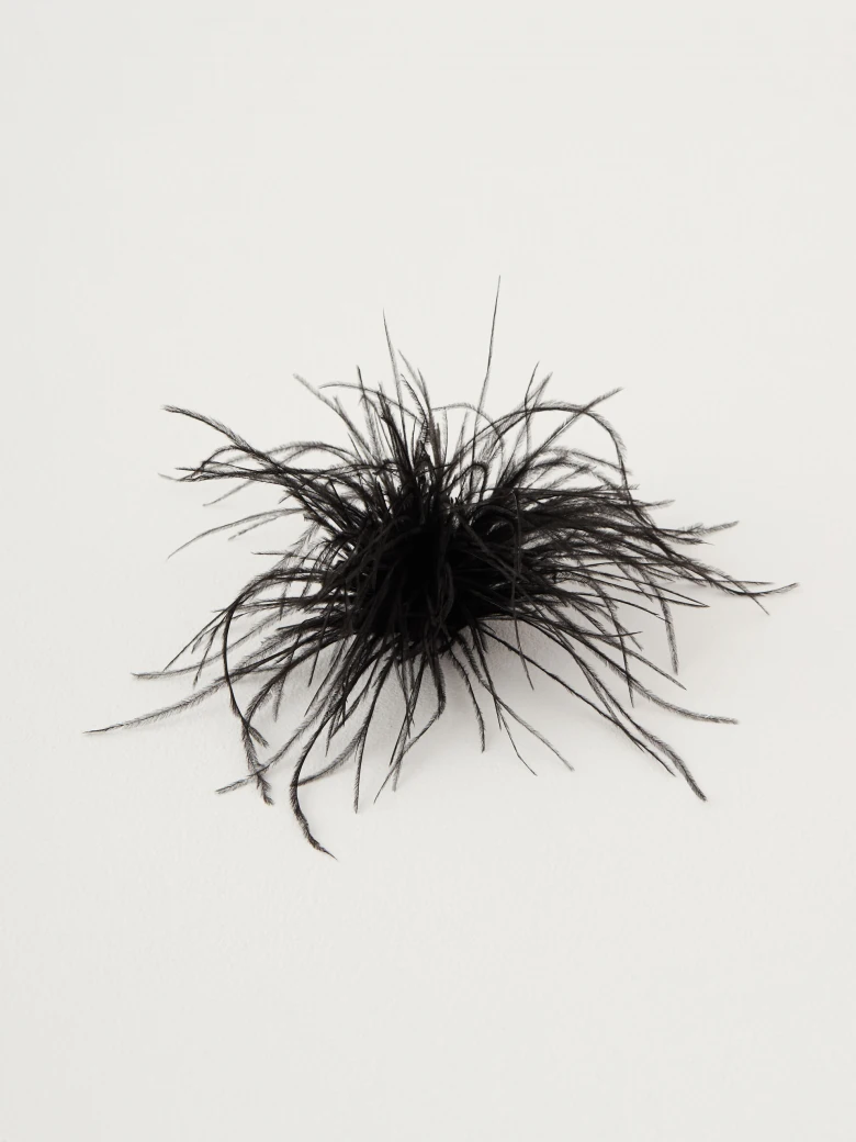 Black feather brooch