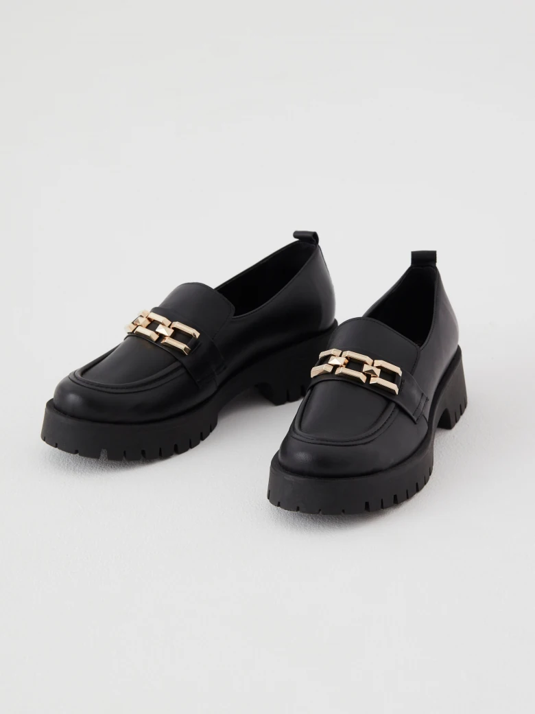 Moccasins made of natural grain leather in color black