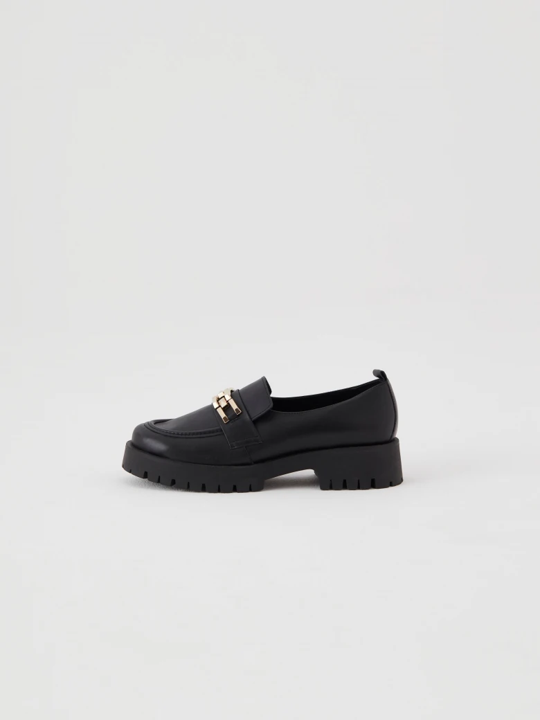 Moccasins made of natural grain leather in color black