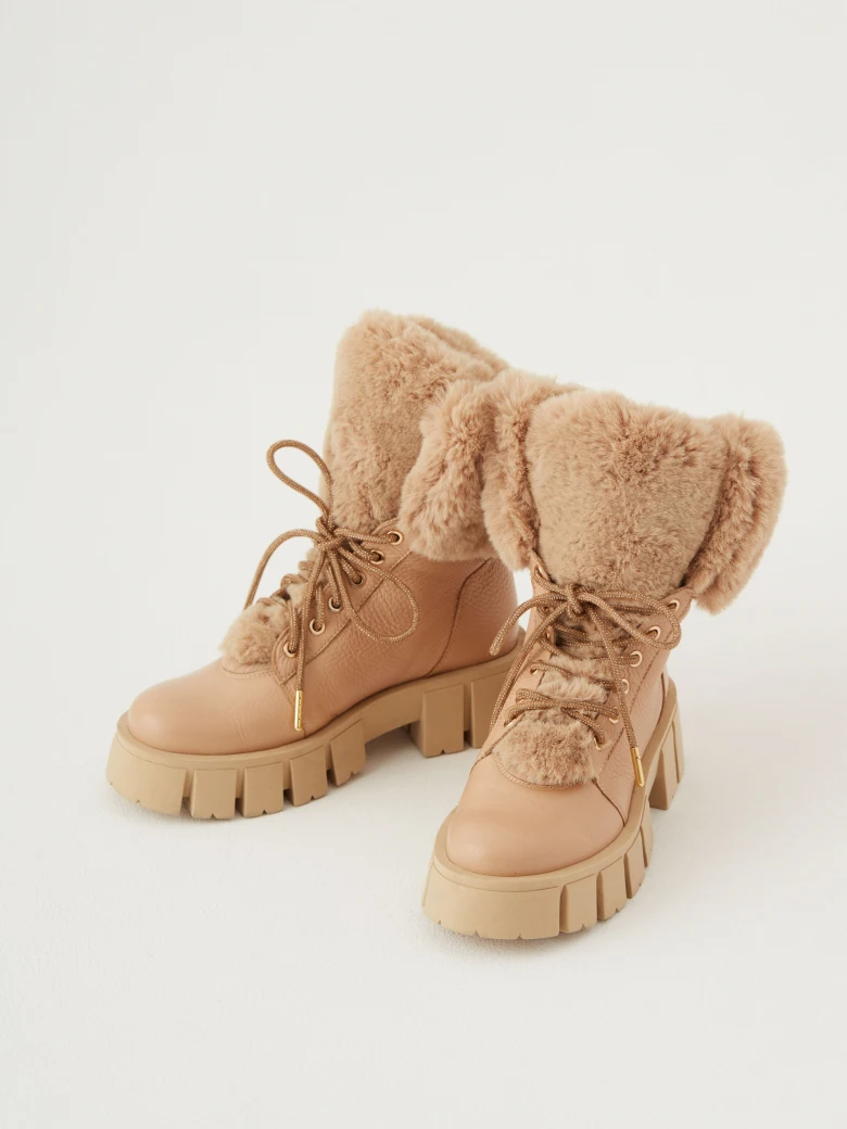 Warmed leather boots