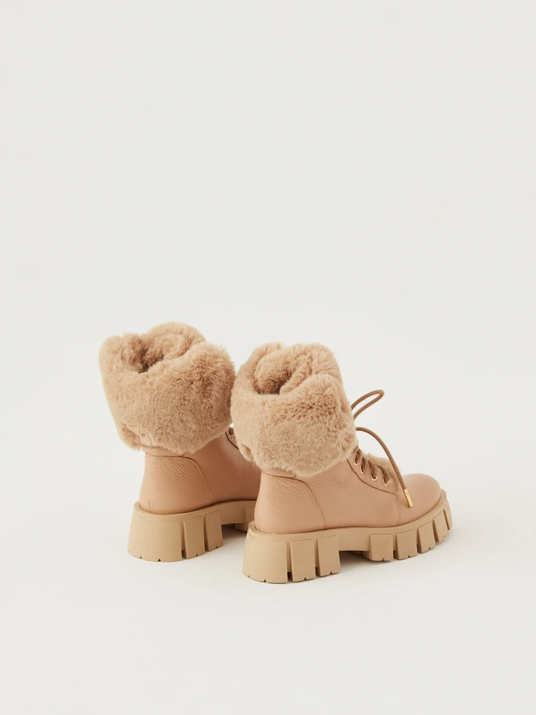 Warmed leather boots