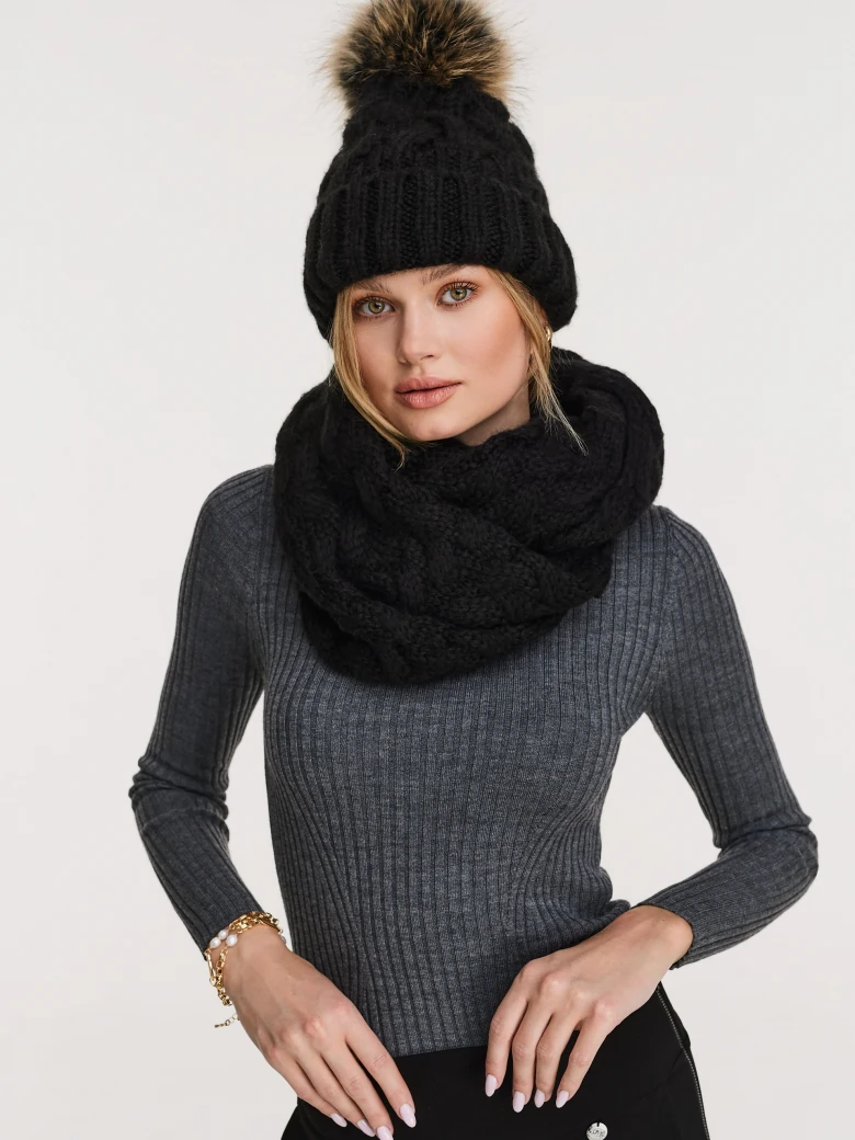 Black beanie with added wool and fur pompom