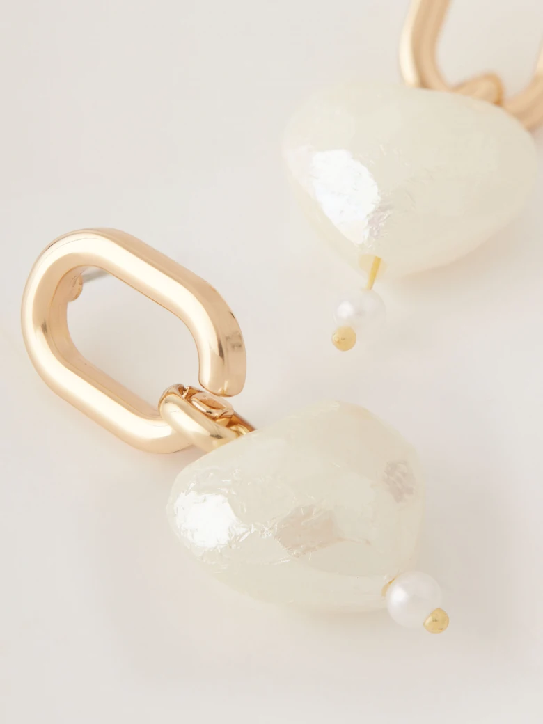 Earrings with heart-shaped pendants