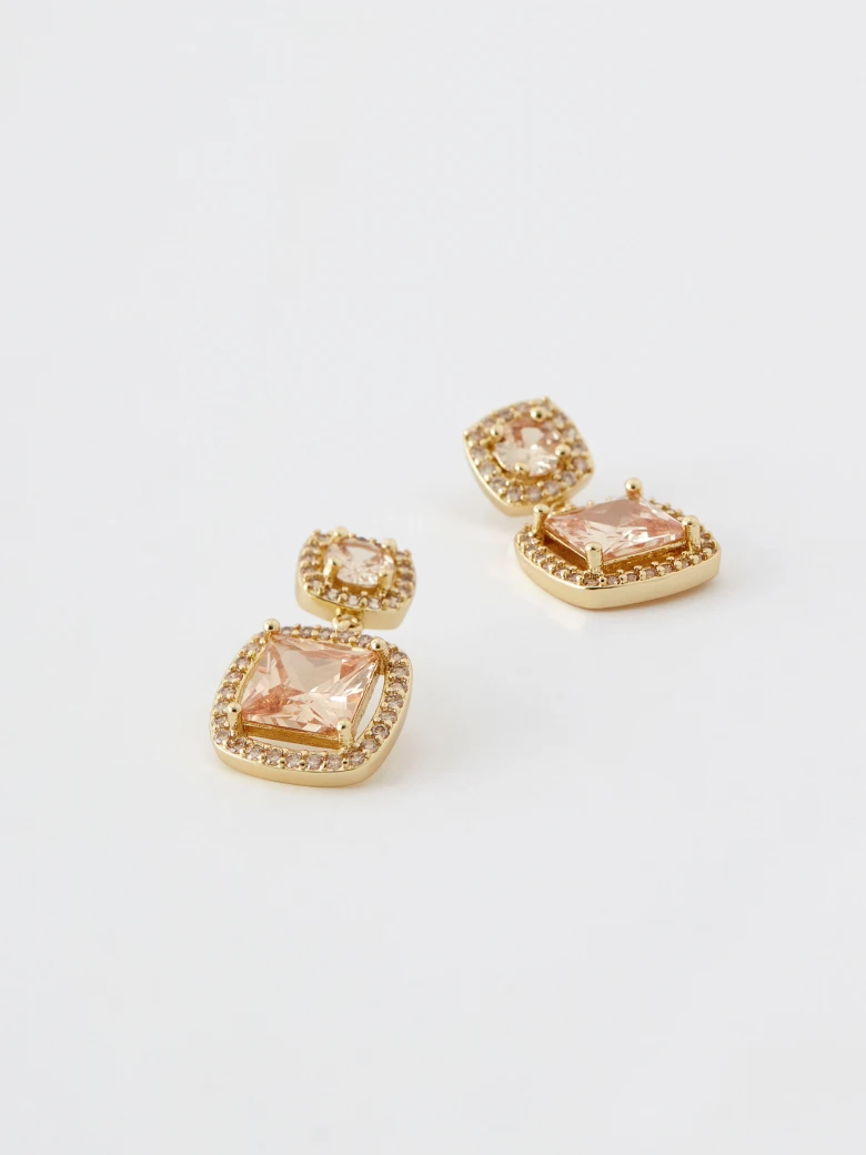 Champagne colored earrings with ornaments