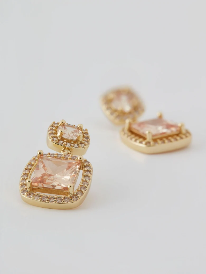 Champagne colored earrings with ornaments