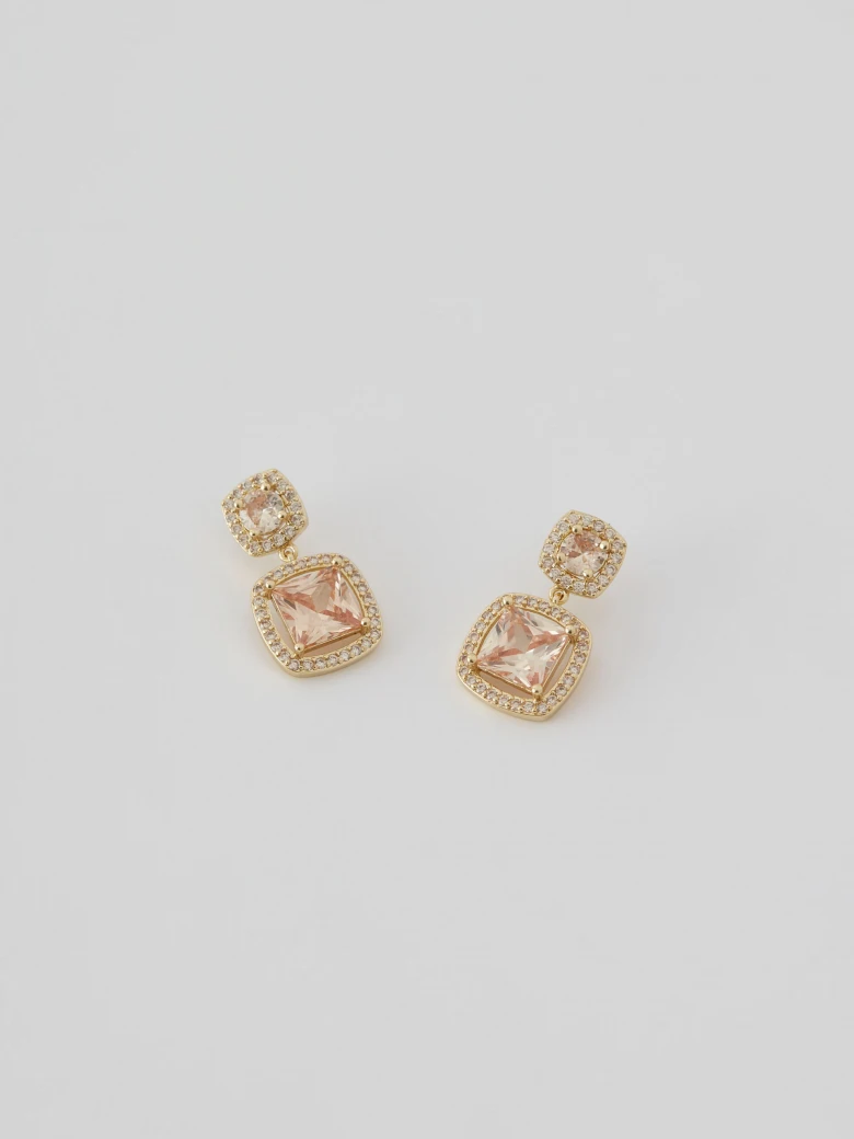 Champagne colored earrings with ornaments