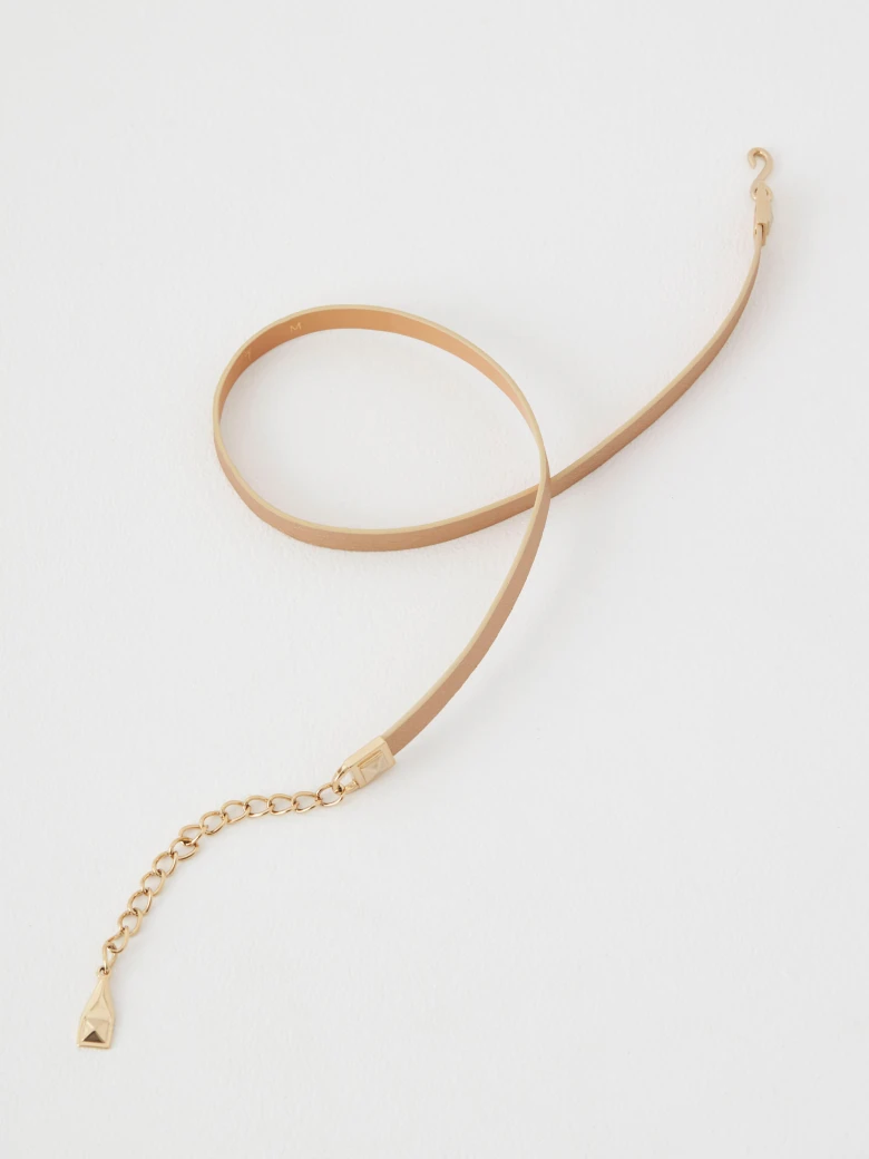 Leather belt in gold color