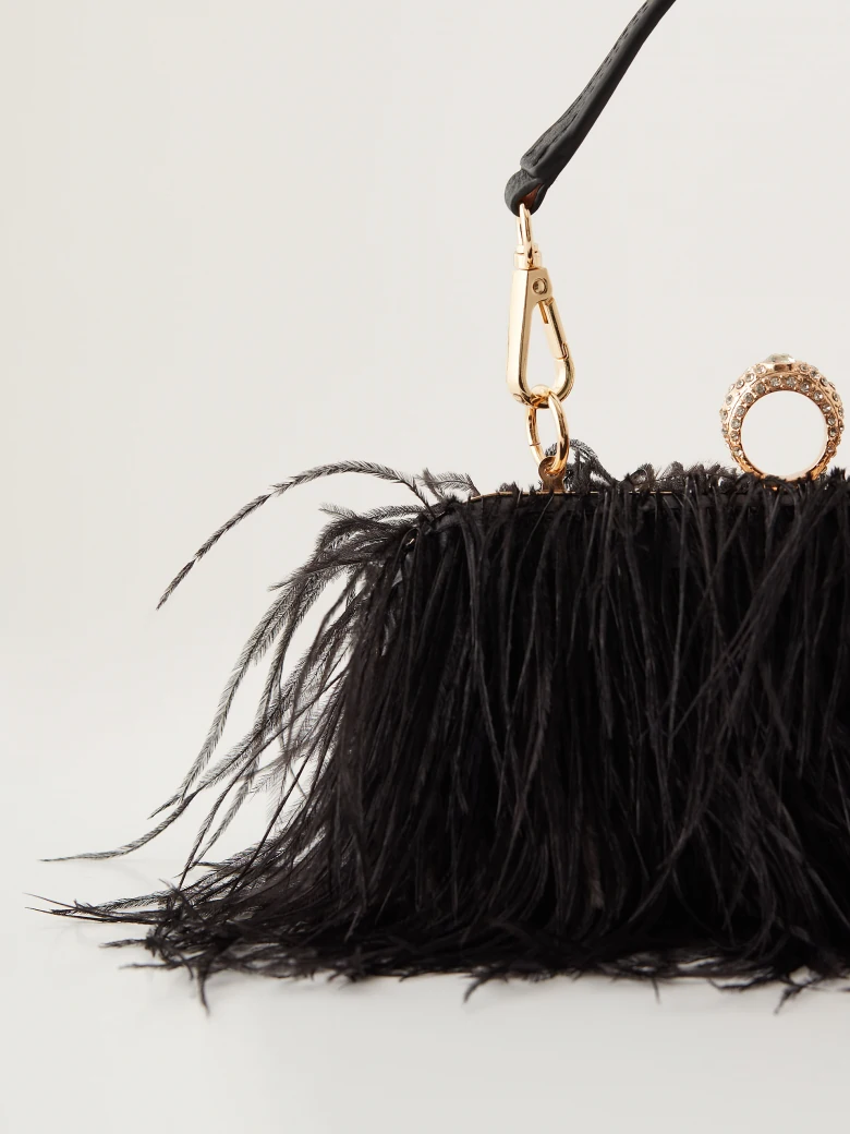 Black handbag with feathers