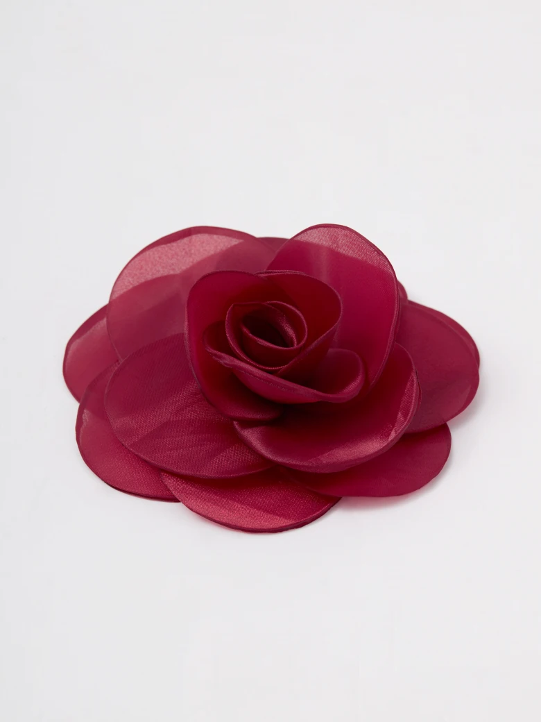 Burgundy flower-shaped brooch