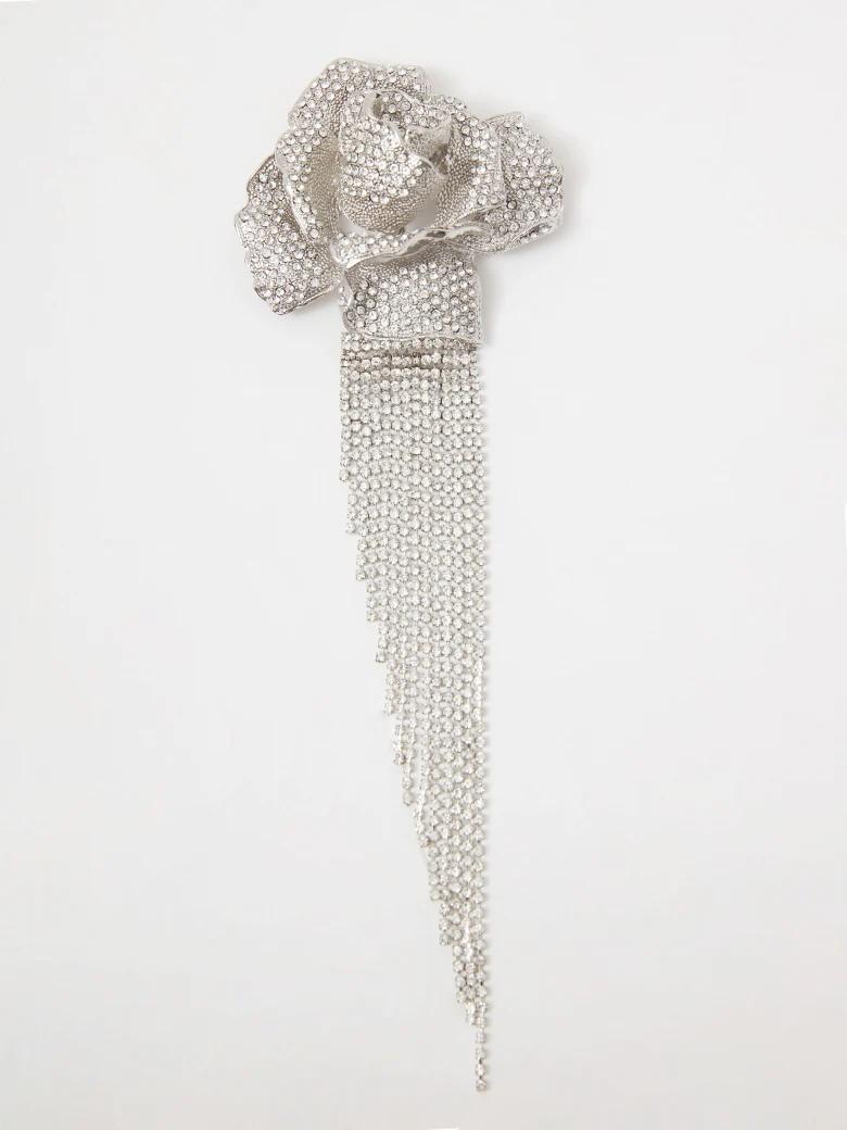 Elegant brooch with a rose and chains