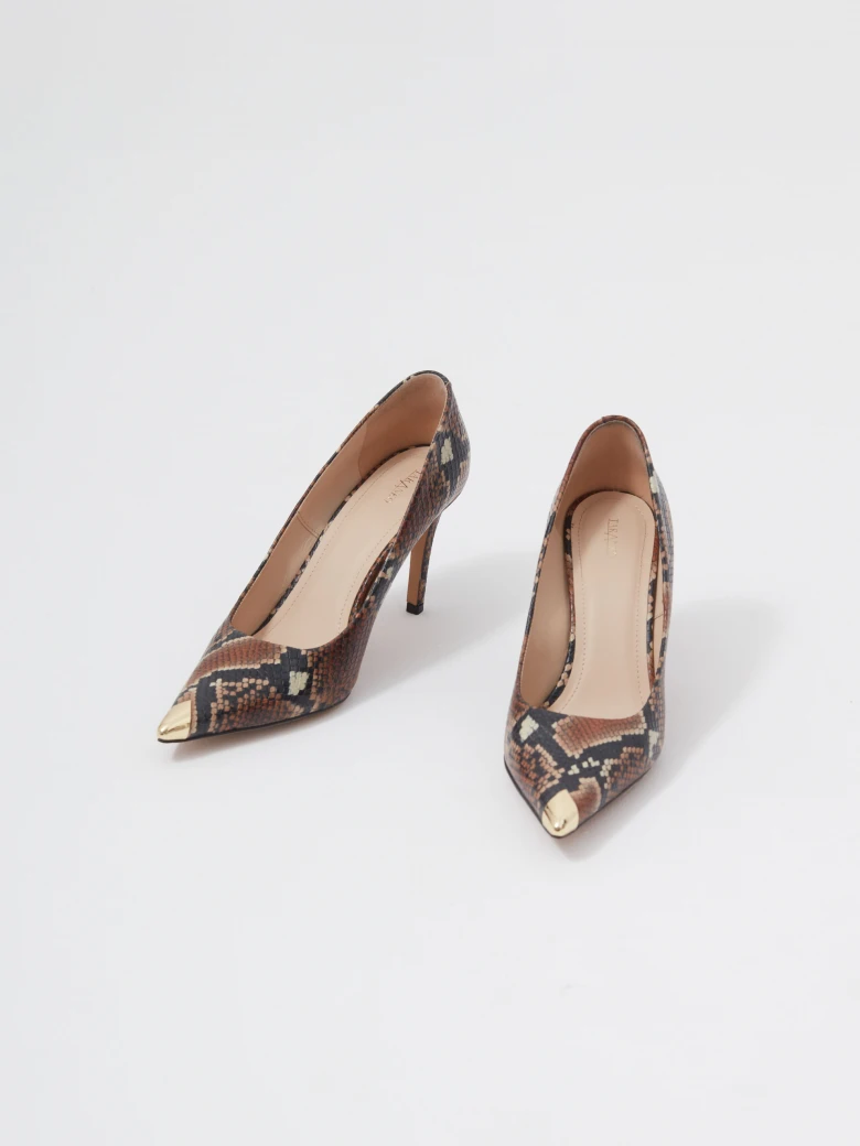 Leather pumps with animal skin motif