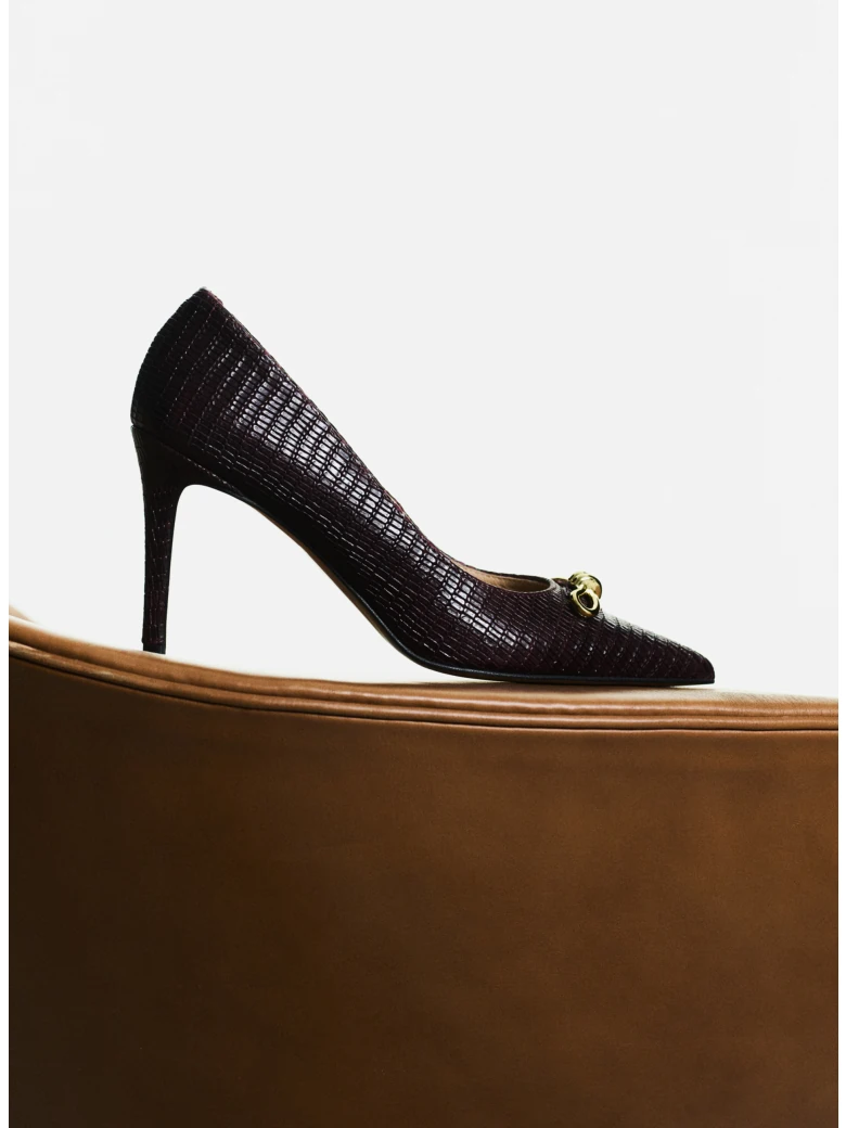 Burgundy leather pumps with decorative bows