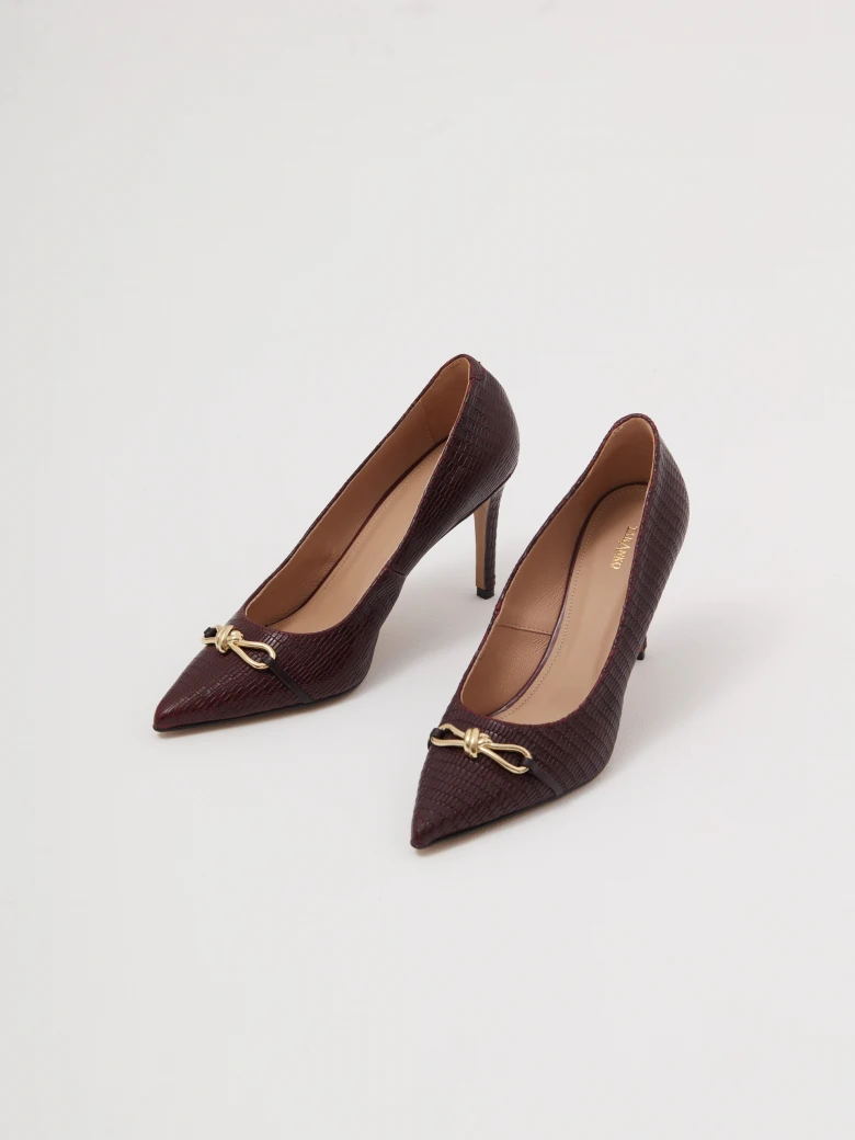 Burgundy leather pumps with decorative bows
