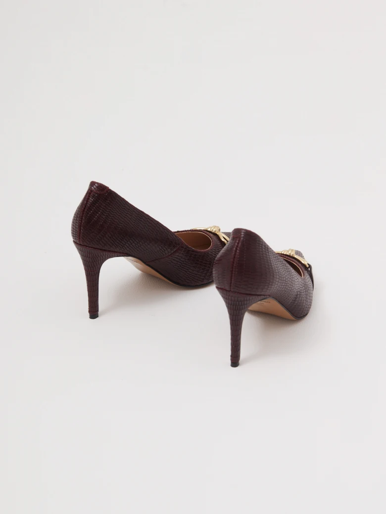 Burgundy leather pumps with decorative bows