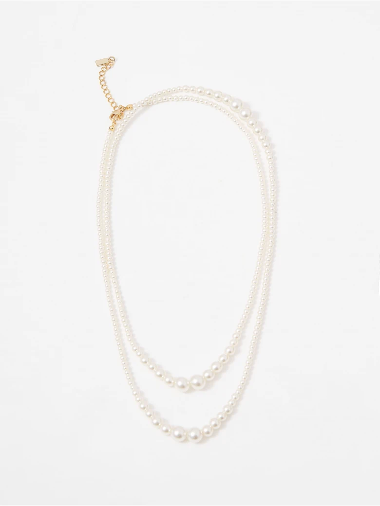 Long pearl bead necklace