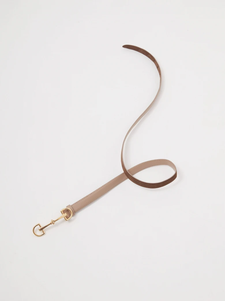 Narrow leather belt with decorative buckle