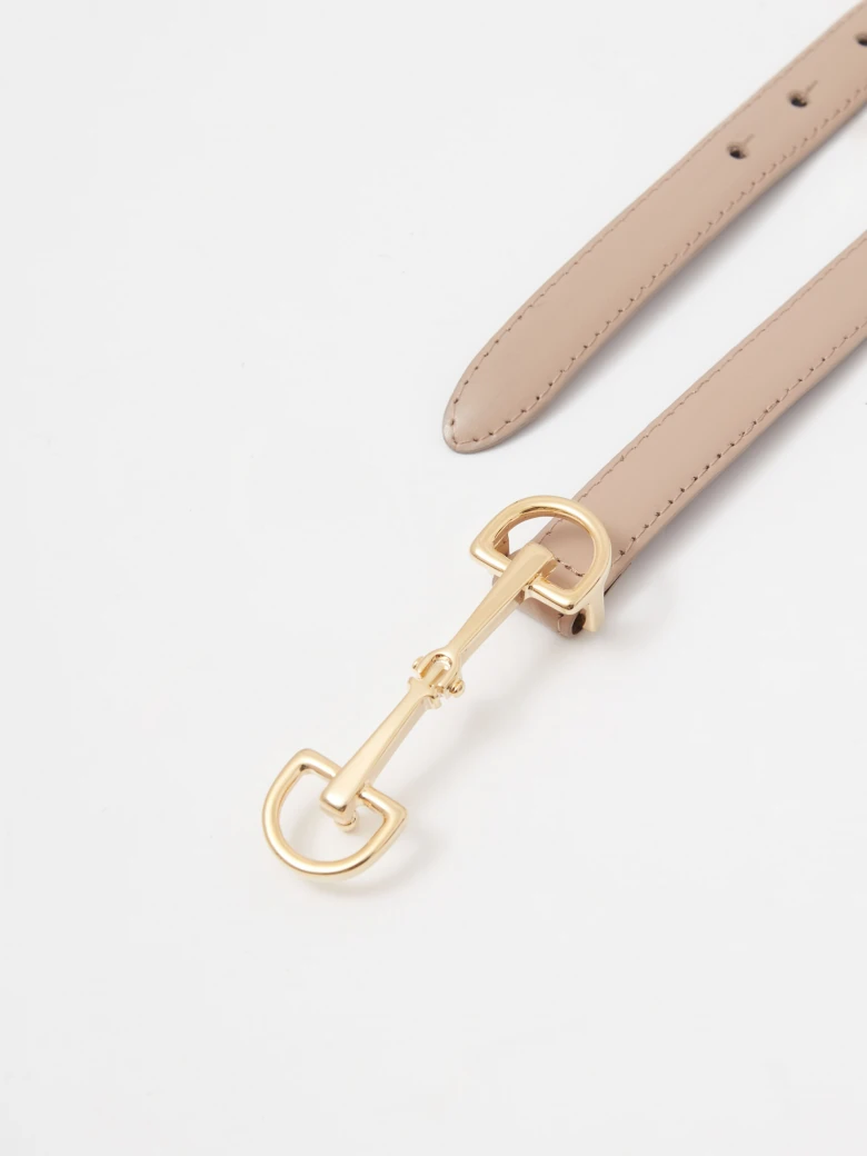 Narrow leather belt with decorative buckle