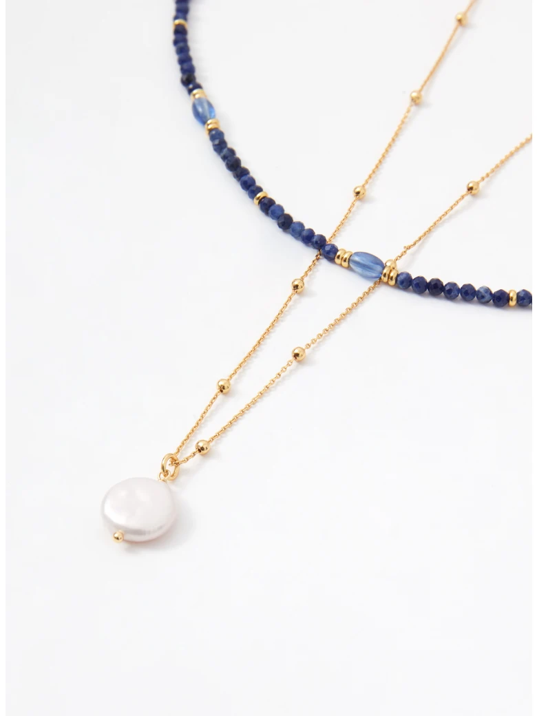 A set of two beaded necklaces with gold-colored pendants